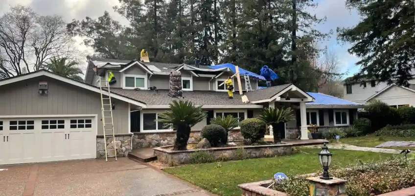 Repair crews worked safely to remove damaged materials and restore the roof after the storm.